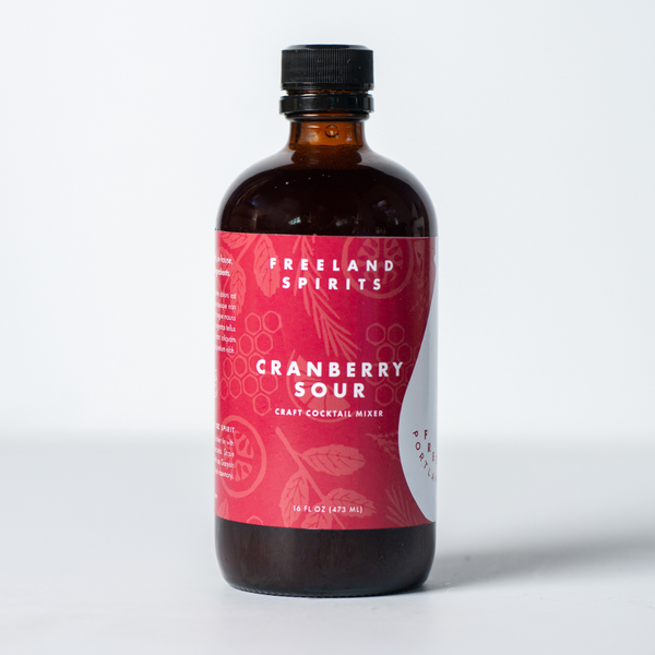 Bottle of Freeland Spirits Cranberry Sour Cocktail Mixer - Holiday 